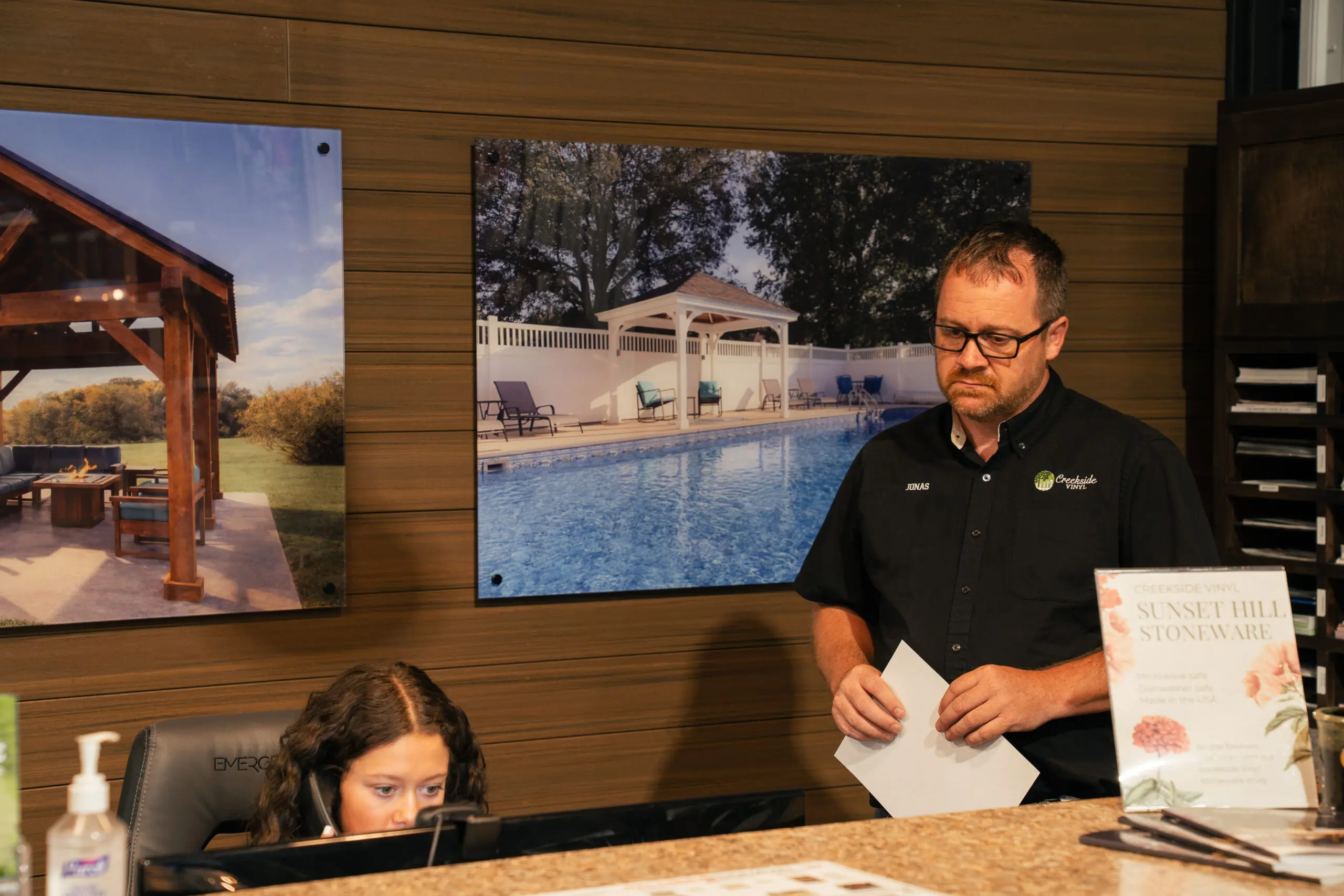 Creekside team assisting a customer inside the showroom