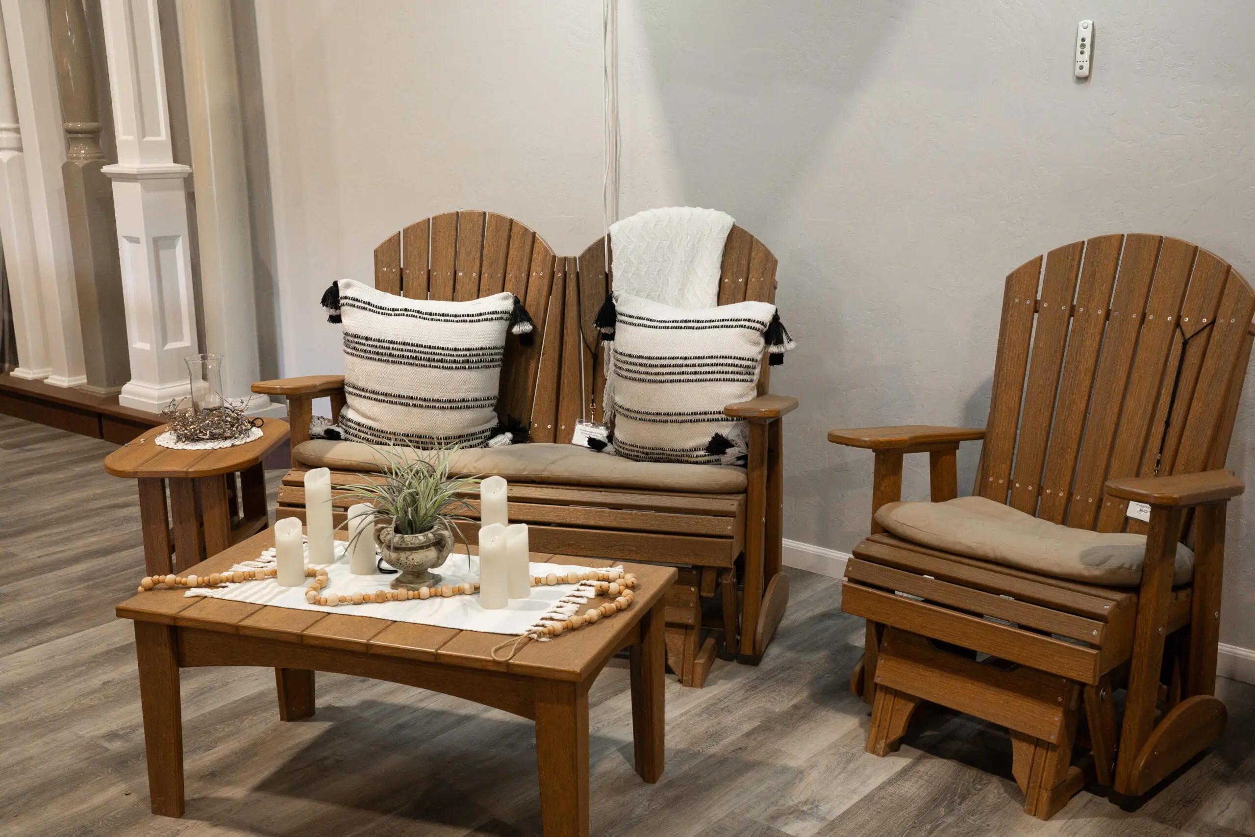 Poly outdoor furniture set with cushions on a showroom floor
